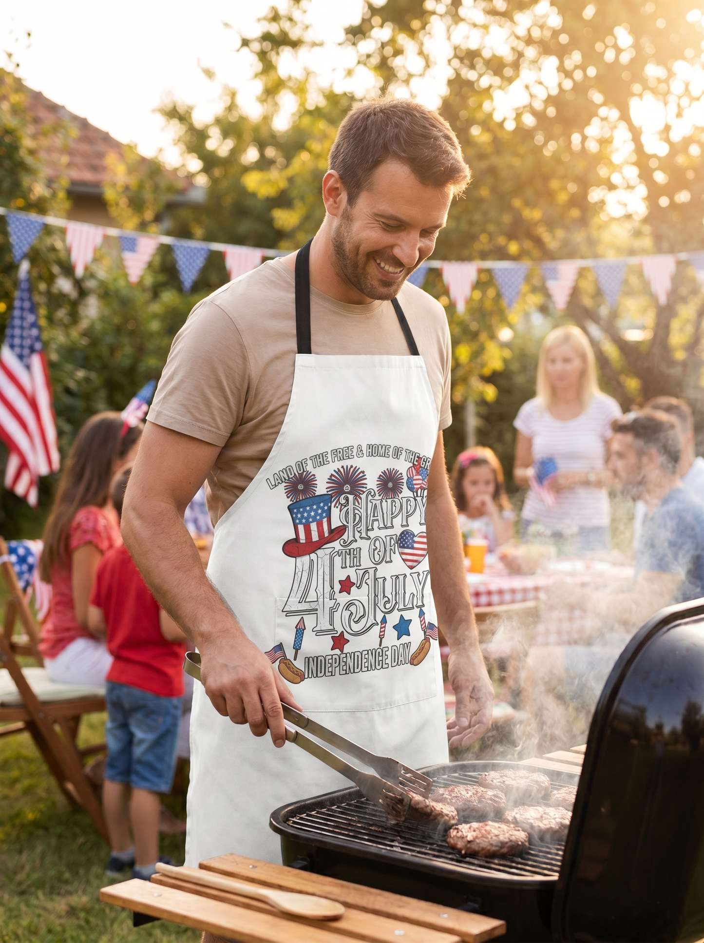 Lifestyle photo of man wearing Land of the Free Home of the Grill apron while grilling