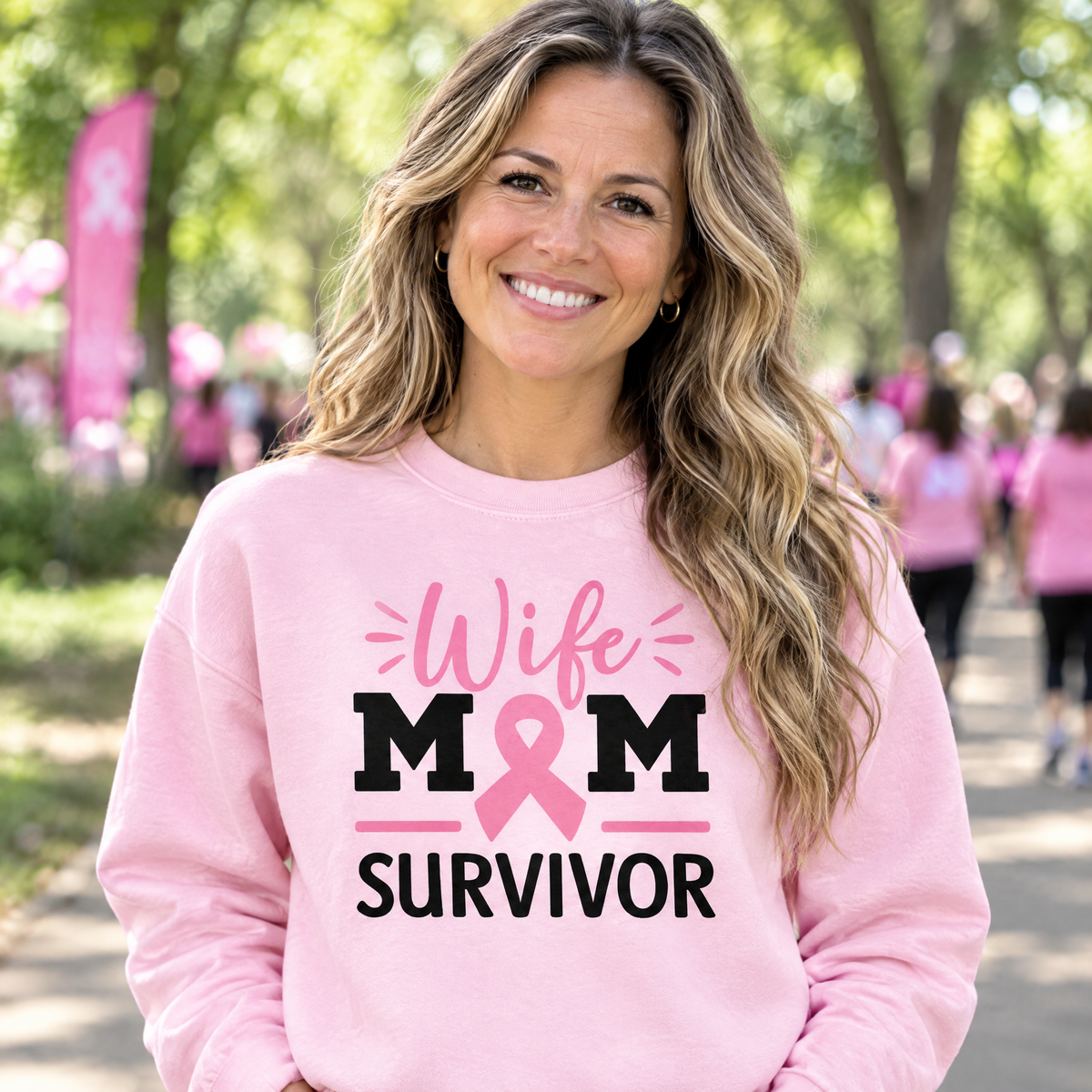 Woman wearing the Wife Mom Survivor breast cancer awareness sweatshirt